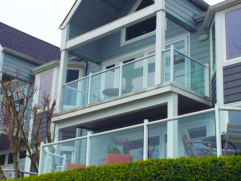 Glass and aluminum railing on deck of house