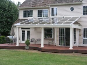 Glass Awning above patio, Global Solariums